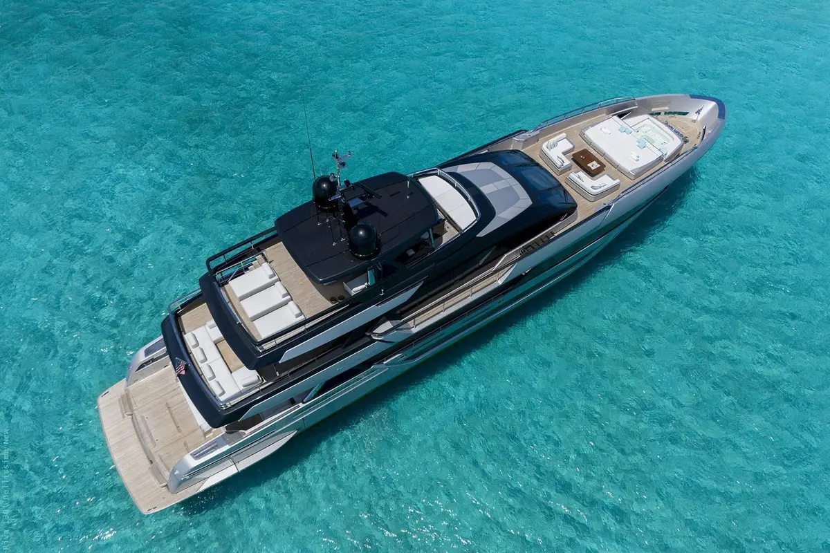 Riva 130, exterior — Yacht Charter Marbella, Marbella. Cinco camarotes y la costa de Estepona en calma