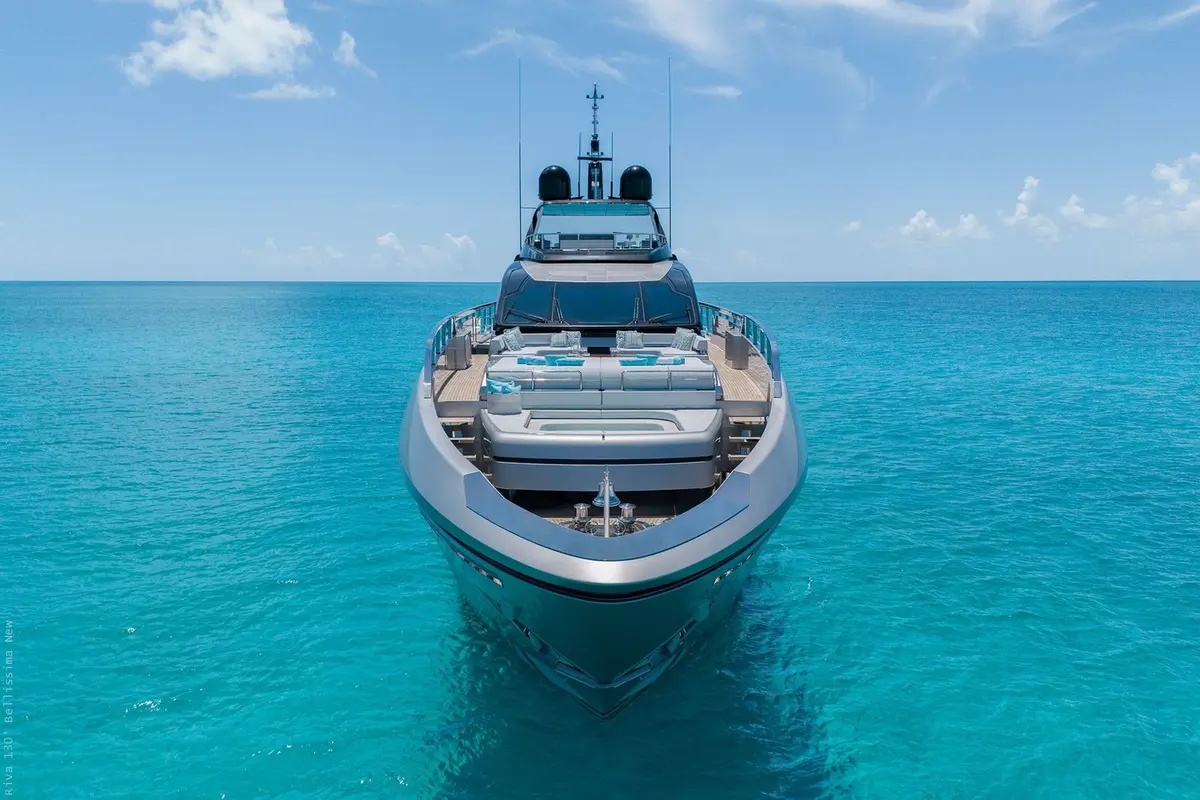Riva 130, exterior — Yacht Charter Marbella, Marbella. Cinco camarotes y la costa de Estepona en calma