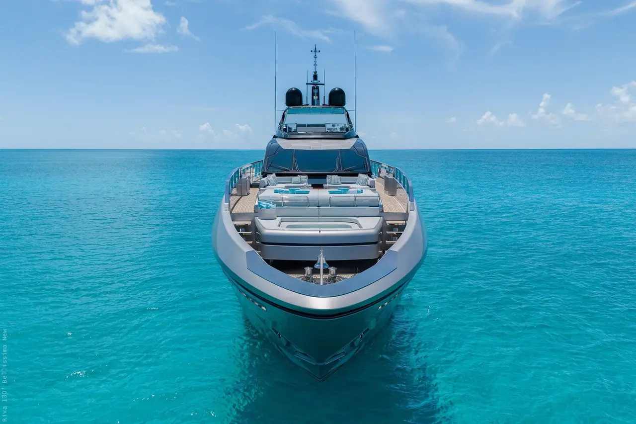 Riva 130, exterior — Yacht Charter Marbella, Marbella. Cinco camarotes y la costa de Estepona en calma